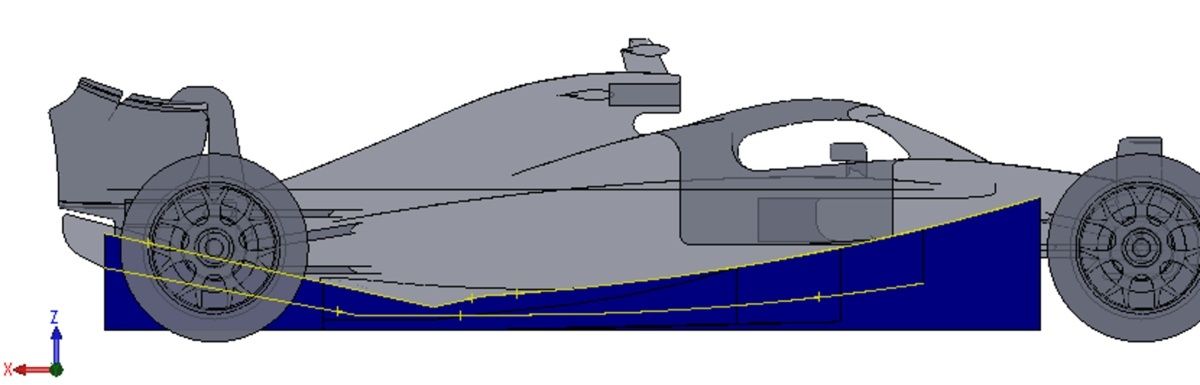 Zijaanzicht van een racewagen met gemodelleerde venturi-tunnel onder de vloer